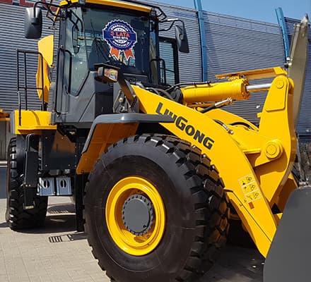 Yellow wheel loader on a construction site